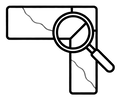 Icono de dos piezas de encimera unidas en L con la junta marcada y una lupa sobre el encuentro.