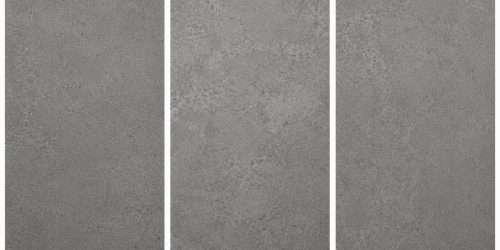 encimera-dekton-sevilla Superficie de encimera ultracompacta en gris cemento con textura granulada y acabado mate.